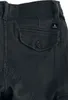 A close-up view of the back pocket of dark gray cargo pants. Produktbild-Vorschau