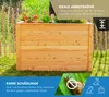 A wooden raised garden bed filled with plants, set in a grassy outdoor environment with a wooden fence in the background. Text overlays highlight product features. Náhled obrázku produktu