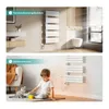 Collage of two images showing a white electric towel warmer in a bathroom and a child playing with a toy next to it. Produktbild-Vorschau