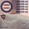 A woman sleeping under a white duvet, with size information and brand logo overlaid. Voir les images du produit