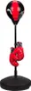 A black and red punching ball set with boxing gloves attached to the stand. Anteprima dell’immagine prodotto