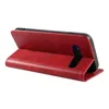 A red flip cover phone case is shown standing upright on a white background. Produktbild-Vorschau