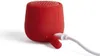 A red Bluetooth speaker is shown plugged into a white charging cable. Produktbild-Vorschau