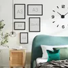 A bedroom scene with framed pictures on the wall, a bedside table, and a bed with pillows. Produktbild-Vorschau