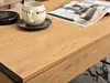 A close-up view of a wooden table with a coffee cup and a magazine. Náhled obrázku produktu