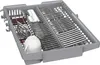 A dishwasher cutlery basket filled with silverware and a small white cup. Produktbild-Vorschau