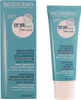 A product box and a tube of cream are shown side-by-side against a light blue background. Podgląd zdjęcia produktu