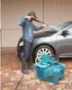 A person is using a pressure washer to clean a car. Náhled obrázku produktu