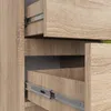 Close-up view of two open drawers in a wooden cabinet, showing the drawer slides. Voir les images du produit