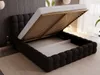 A black upholstered bed frame with the mattress lifted to reveal the storage compartment underneath. Náhľad obrázku produktu