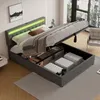 A modern upholstered bed with storage, featuring an open bed frame revealing storage compartments and mattresses within. Náhled obrázku produktu