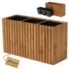 A wooden planter box with three black inserts, shown with a tag attached. Náhled obrázku produktu