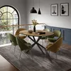 A dining room with a table and chairs, set up for a meal. Náhľad obrázku produktu