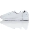 A pair of white Puma sneakers shown from a side and back angle, with a reflection on a white surface. Anteprima dell’immagine prodotto