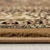A close-up view of the edge and texture of a rug. Produktbild-Vorschau