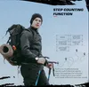 A man with a backpack and hiking poles is shown against a blue sky, with text and graphics highlighting the features of a smartwatch. Produktbild-Vorschau