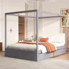 A bedroom scene featuring a canopy bed with drawers, bedside table, and wardrobe. Produktbild-Vorschau