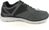 A side view of a gray and black Skechers athletic shoe against a white background. Produktbild-Vorschau