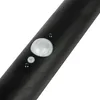 A close-up view of a black cylindrical object with two sensors and two small screws. Produktbild-Vorschau