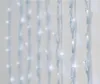 A close-up view of a string of white LED lights, likely for decoration. Voir les images du produit