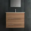 A modern bathroom vanity with a wooden finish and two drawers, featuring a white countertop and a sleek silver faucet against a dark tiled wall. Produktbild-Vorschau