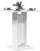 A white bistrot table set with four place settings and a vase of greenery. Podgląd zdjęcia produktu