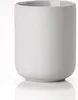 A studio shot of a soft grey ceramic toothbrush holder on a white background. Produktbild-Vorschau