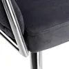 A close-up view of a dark gray upholstered chair with chrome accents. Anteprima dell’immagine prodotto