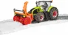 A toy tractor with a snow blower attachment clearing snow. Anteprima dell’immagine prodotto