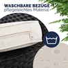 Close-up of a cushion on a black rattan furniture piece, with water droplets on the fabric and a washing symbol. Produktbild-Vorschau