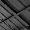 Close-up view of the metal frame and corrugated roof of a garden pavilion. Produktbild-Vorschau