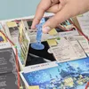 A hand is placing a blue figurine on a board game, which appears to be a murder mystery game with clues and suspect cards laid out. Produktbild-Vorschau