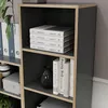 A close-up view of a bookshelf with books and a vase. Anteprima dell’immagine prodotto