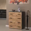 A modern dresser with wooden drawers and a gray top, placed in a room with artwork on the wall and an umbrella stand next to it. Produktbild-Vorschau