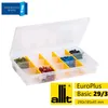 A transparent sorting box filled with various small hardware items like screws, connectors, and other fasteners, with the lid open. A yellow logo and product information are visible in the bottom right corner. Voir les images du produit