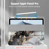 A tablet case with a marble pattern is shown with an Apple Pencil Pro being placed into a built-in slot. Produktbild-Vorschau