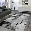 A modern living room with a sofa, rug, and side table. Produktbild-Vorschau