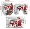 A collage of three Christmas-themed bath mats featuring Santa Claus and snowmen. Produktbild-Vorschau