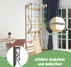 A children's indoor climbing frame set up in a room with a desk and chair. Produktbild-Vorschau