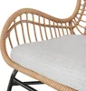 Close-up of a rattan chair with a gray cushion. Náhled obrázku produktu
