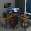 A gaming setup with a corner desk, dual monitors, and a gaming chair. Anteprima dell’immagine prodotto