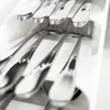 Close-up shot of silverware in a white drawer organizer. Anteprima dell’immagine prodotto