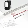 A black printer ink cartridge is shown on a stack of white paper, with a line drawing of a printer in the foreground. Text indicates high page yield. Produktbild-Vorschau