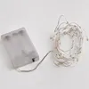 A battery pack and a coiled string of micro LED lights on a white background. Produktbild-Vorschau