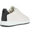A side view of a white and black Geox sneaker. Náhled obrázku produktu