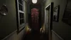 A dimly lit hallway with candles and a checkered curtain. Produktbild-Vorschau