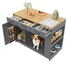 A kitchen island with various storage compartments, drawers, and a designated pet area, featuring a dog. The island is stocked with kitchen items and pet supplies. Anteprima dell’immagine prodotto