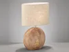 A table lamp with a wooden base and fabric shade, displayed against a plain background. Produktbild-Vorschau