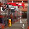 A red electric hoist with various features labeled. Produktbild-Vorschau