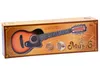 A product box for a toy guitar, featuring an image of the guitar and musical notes. Náhľad obrázku produktu